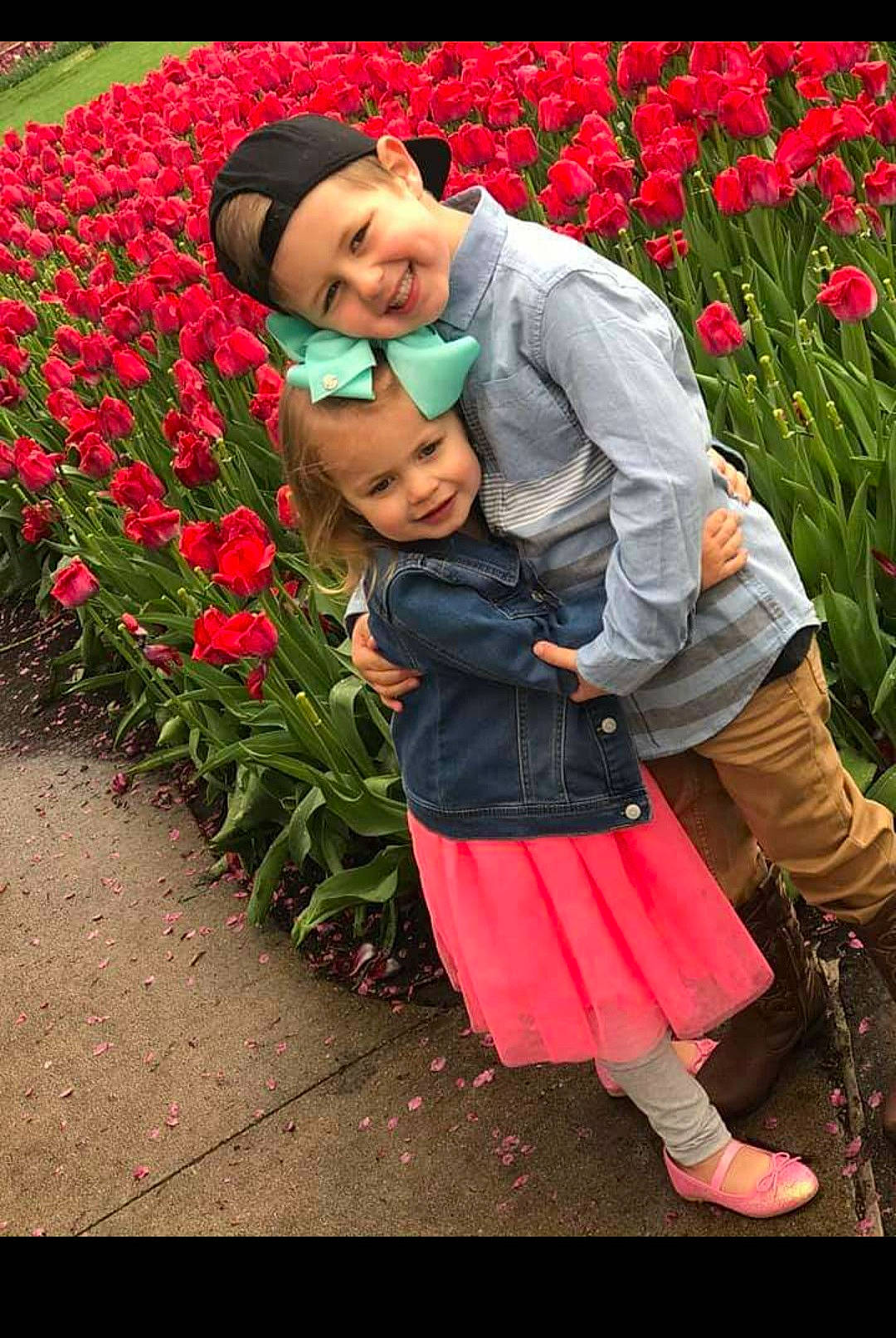 Leianna joined the competition — help win amazing prizes! botany, child, flower, happy, headwear, joy, lily_family, perennial_plant, person, photography, plant, smile, spring, toddler, tulip