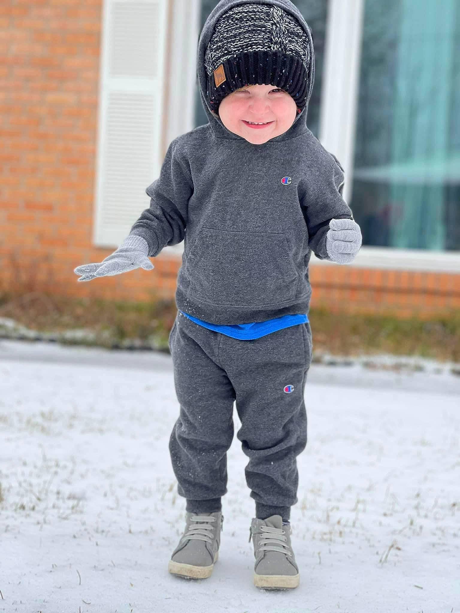 Kannon is registered to the contest to win money with this photo: baby_toddler_clothing, cap, cool, denim, electric_blue, freezing, fun, happy, headgear, headwear, jacket, joy, knit_cap, outerwear, person, recreation, sleeve, smile, snow, sports_equipment