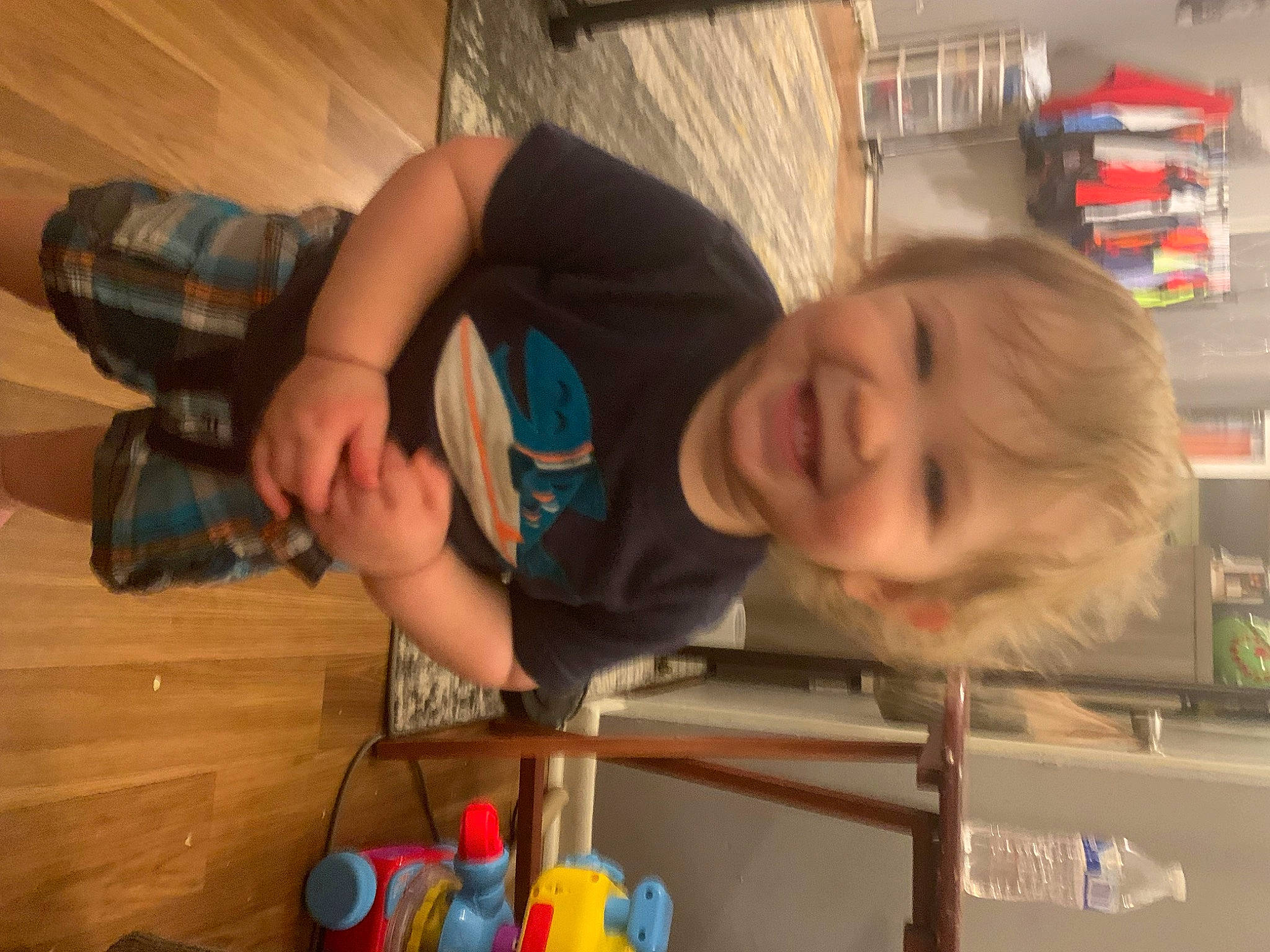 Kayden joined the competition — help win amazing prizes! baby, baby_products, baby_toddler_clothing, baby_toys, child, flooring, fun, joy, nursery, person, play, room, shelf, smile, snapshot, t_shirt, toddler, toy, wood