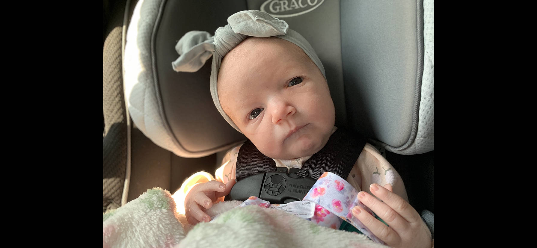 Houston joined the competition — help win amazing prizes! baby, baby_in_car_seat, cheek, comfort, ear, eye, eyebrow, eyelash, finger, gesture, happy, head, iris, lip, mouth, nose, person, pink, seat_belt, skin