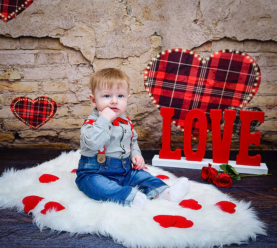 Scott joined the competition — help win amazing prizes! child, christmas, christmas_eve, design, doll, footwear, fur, heart, love, outerwear, pattern, person, plaid, plant, red, shoe, sitting, tartan, textile, toddler