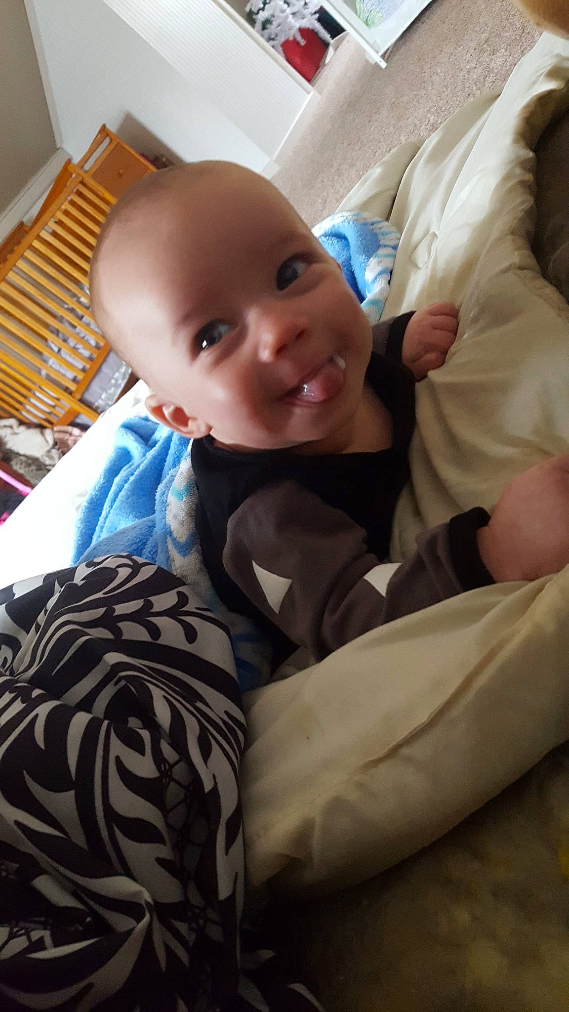 Joseph is registered to the contest to win money with this photo: baby, cheek, child, furniture, joy, leg, person, sitting, skin, smile, toddler