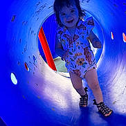 Raelynn joined the competition — help win amazing prizes! toddler, child, smiling, playground, slide, blue_tunnel, romper, sandals, hair, happy, outdoor, play, fun, cute, joyful, person, clothing, red_pole, legs, walking