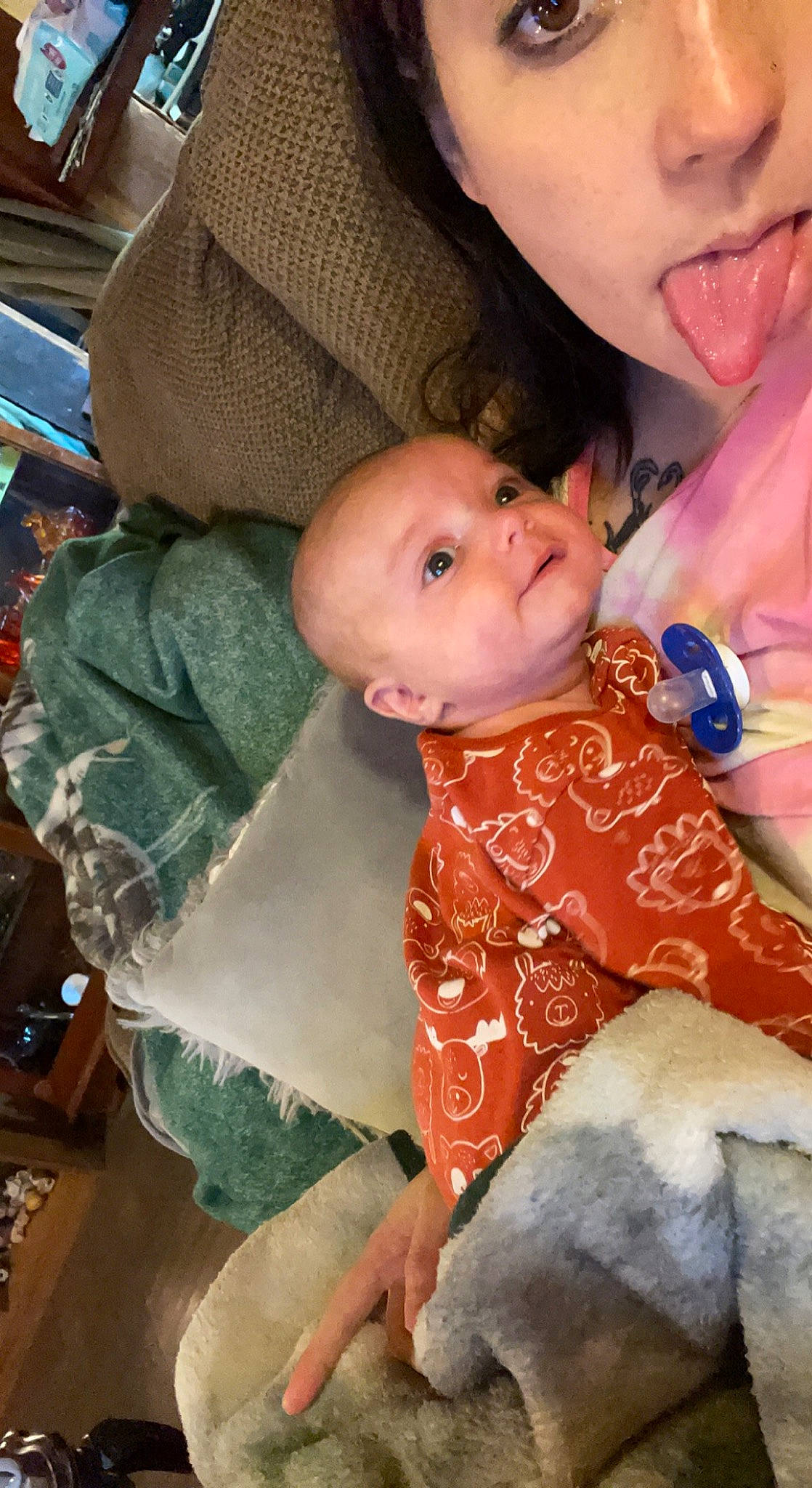 Kyson joined the competition — help win amazing prizes! baby, baby_products, baby_toddler_clothing, cheek, child, comfort, facial_expression, fun, happy, iris, lap, linens, nose, pattern, people, person, room, sitting, skin, smile