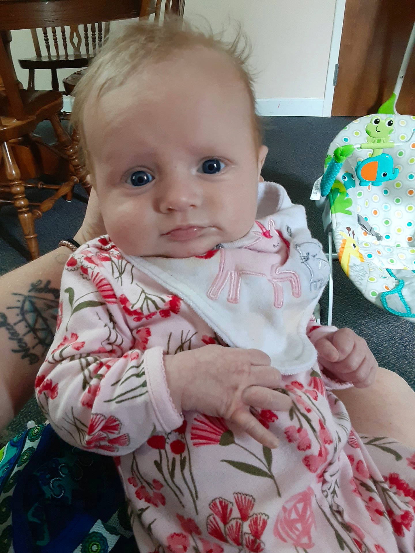 Makayla is registered to the contest to win money with this photo: baby, baby_products, baby_toddler_clothing, chair, cheek, child, comfort, event, happy, iris, lamp, linens, pattern, person, room, sitting, skin, sleeve, t_shirt, toddler