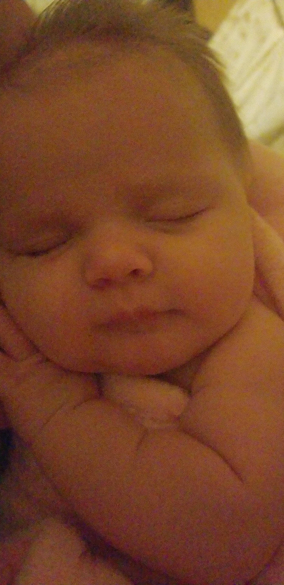 Brighton is registered to the contest to win money with this photo: baby, bedtime, cheek, child, chin, close_up, eye, eyebrow, face, finger, forehead, hand, head, lip, mouth, muscle, nose, person, skin, sleep