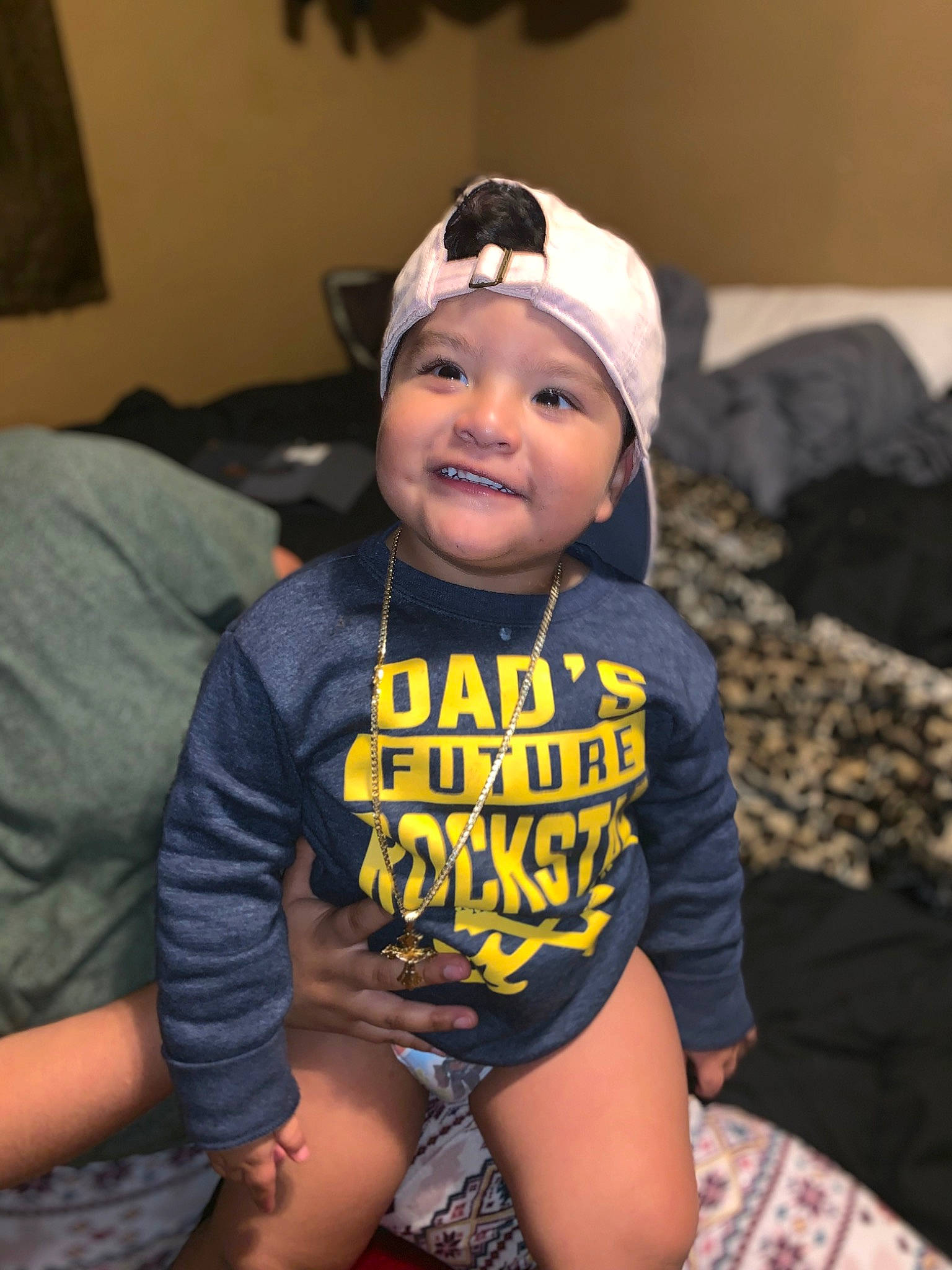 Lionel joined the competition — help win amazing prizes! baby, batman, cheek, child, cool, fictional_character, head, headgear, headwear, leg, person, t_shirt, thigh, toddler