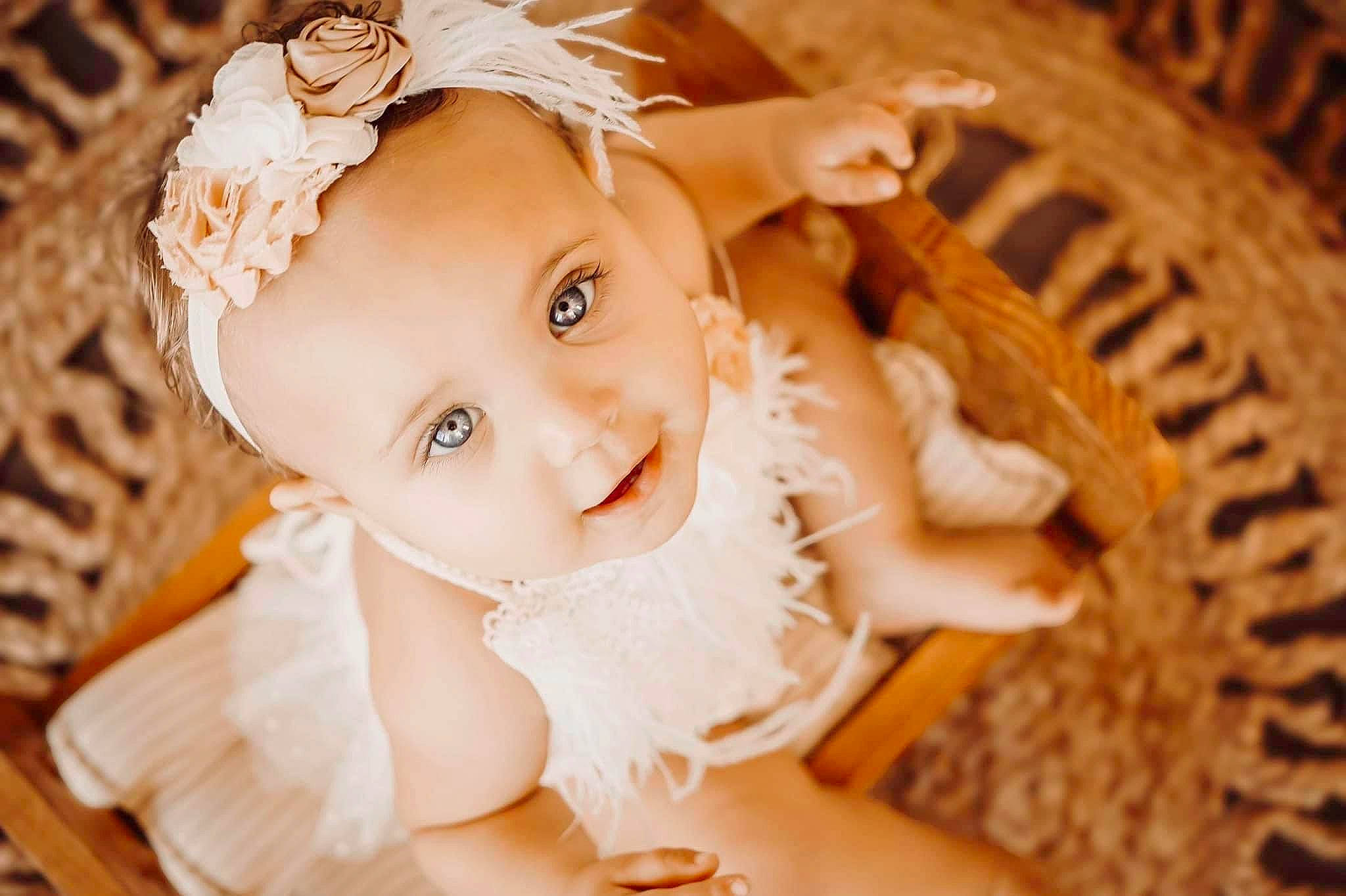 Maisyn is registered to the contest to win money with this photo: bridal_accessory, doll, dress, embellishment, eyelash, fawn, flash_photography, happy, headband, headgear, headpiece, iris, jewellery, person, petal, plant, skin, smile, textile, toy