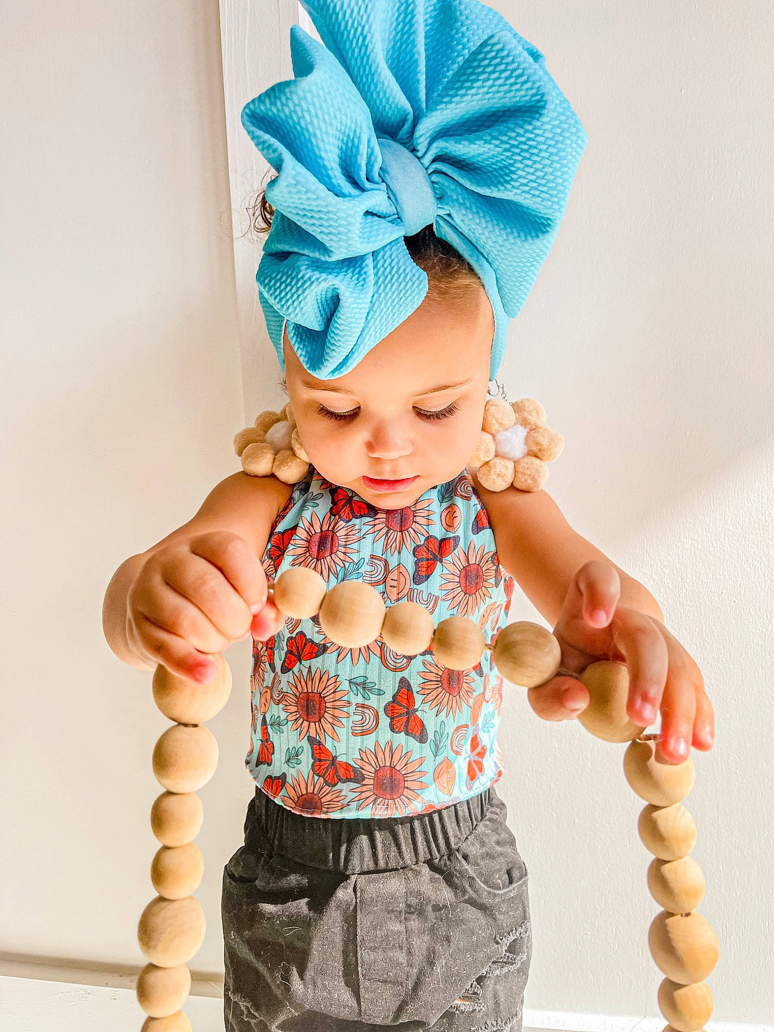 Maisyn joined the competition — help win amazing prizes! arm, baby_toddler_clothing, child, clothing, costume_hat, fashion_design, finger, gesture, headgear, headwear, jewellery, nail, neck, outerwear, pattern, person, pink, sleeve, thumb, toddler