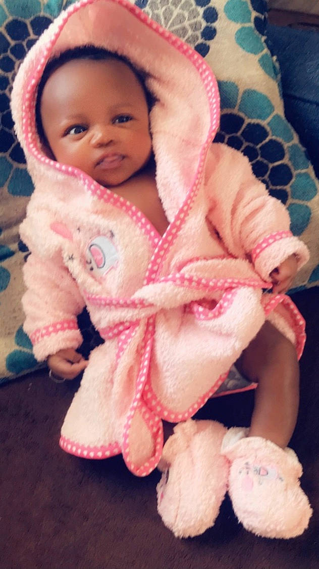 Jesslyn joined the competition — help win amazing prizes! arm, baby, baby_toddler_clothing, cheek, comfort, creative_arts, hand, linens, lip, nail, outerwear, pattern, person, pink, skin, sleeve, textile, thumb, toddler, white