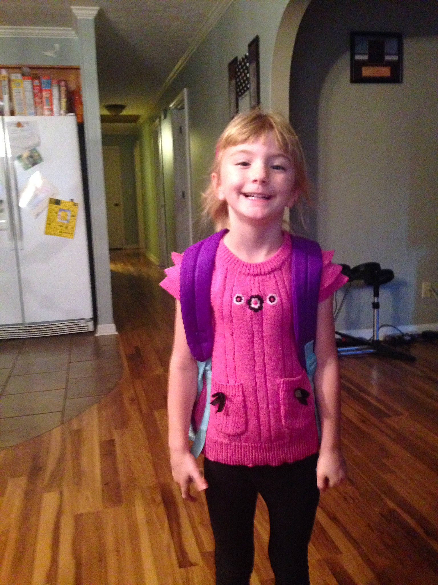 Lorraine is registered to the contest to win money with this photo: child, floor, flooring, joint, joy, magenta, outerwear, person, pink, purple, shoulder, sleeve, standing, t_shirt, toddler