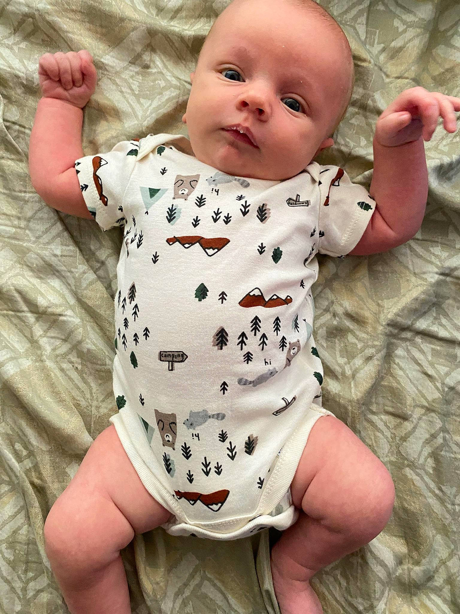 Callahan is registered to the contest to win money with this photo: baby, baby_toddler_clothing, cheek, collar, comfort, eye, face, facial_expression, gesture, hand, head, human_body, joint, lip, neck, person, skin, sleeve, stomach, toddler