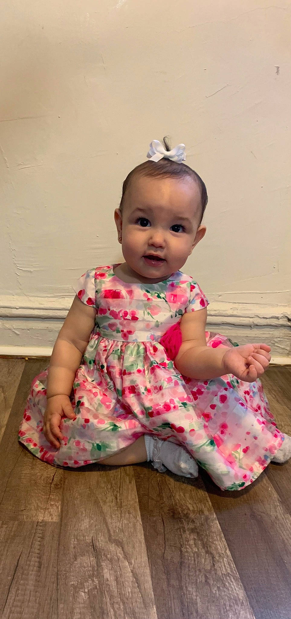 Avah joined the competition — help win amazing prizes! baby, baby_toddler_clothing, cheek, child, day_dress, dress, floor, flooring, happy, magenta, neck, one_piece_garment, pattern, person, pink, shoulder, sitting, skin, sleeve, toddler