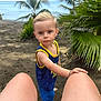 Mattoe joined the competition — help win amazing prizes! child, boy, beach, sand, palm_tree, ocean, summer, clothing, blue_shorts, yellow_trim, person, hand, legs, nature, outdoor, tropical, vacation, portrait, curious, sunny