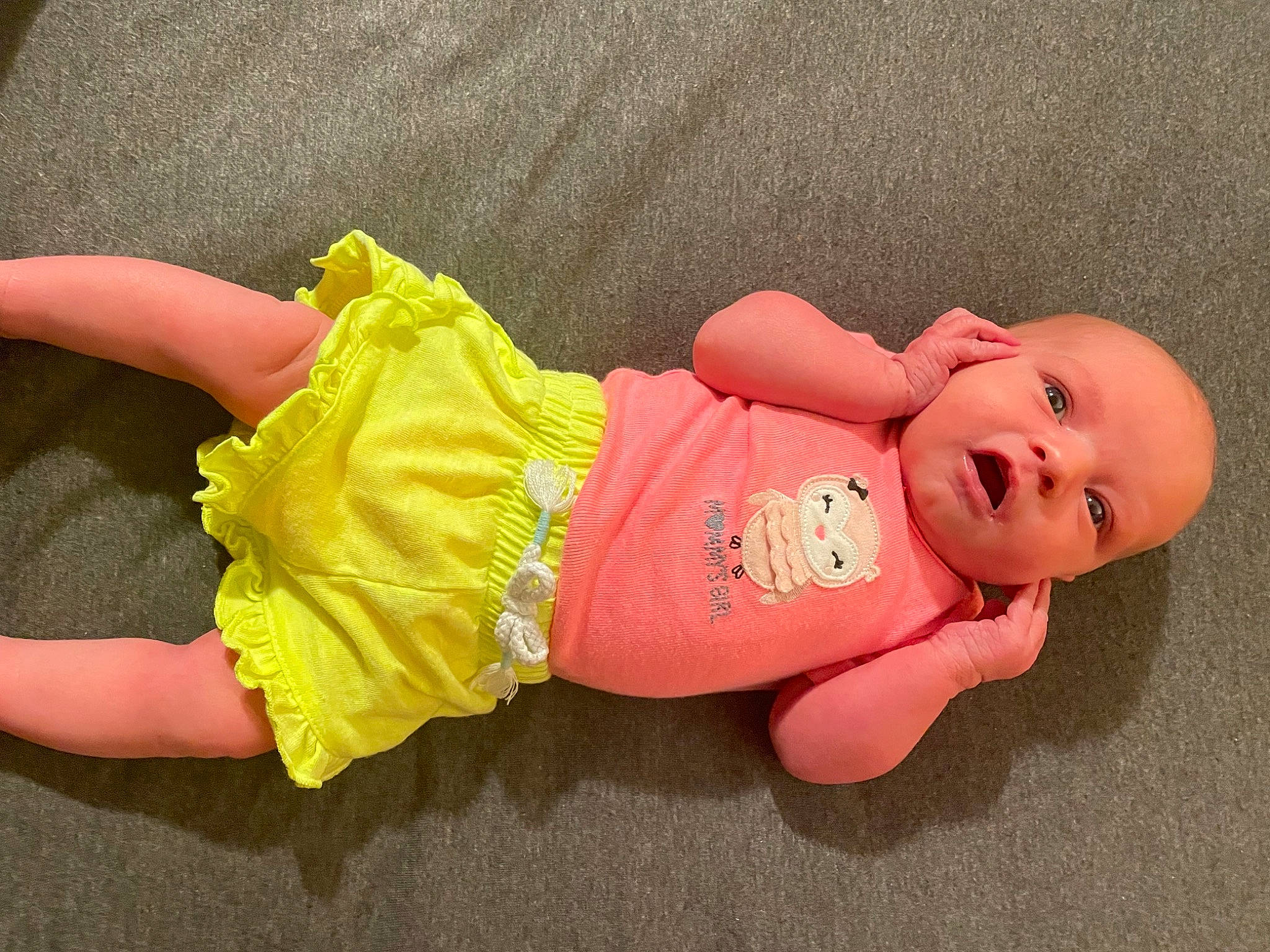 Loralyn is registered to the contest to win money with this photo: baby, baby_products, baby_toddler_clothing, cheek, child, doll, eye, finger, fun, happy, joint, leg, magenta, mammal, person, pink, skin, sleeve, smile, thigh