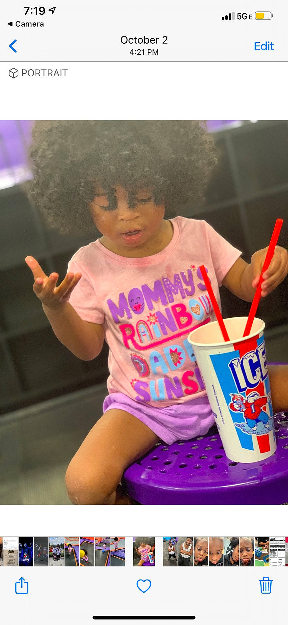 Nala joined the competition — help win amazing prizes! child, drink, drinking_straw, food, fun, happy, human_leg, leisure, magenta, party_supply, person, plastic, recreation, shorts, sitting, sleeve, snapshot, sweetness, t_shirt, thigh