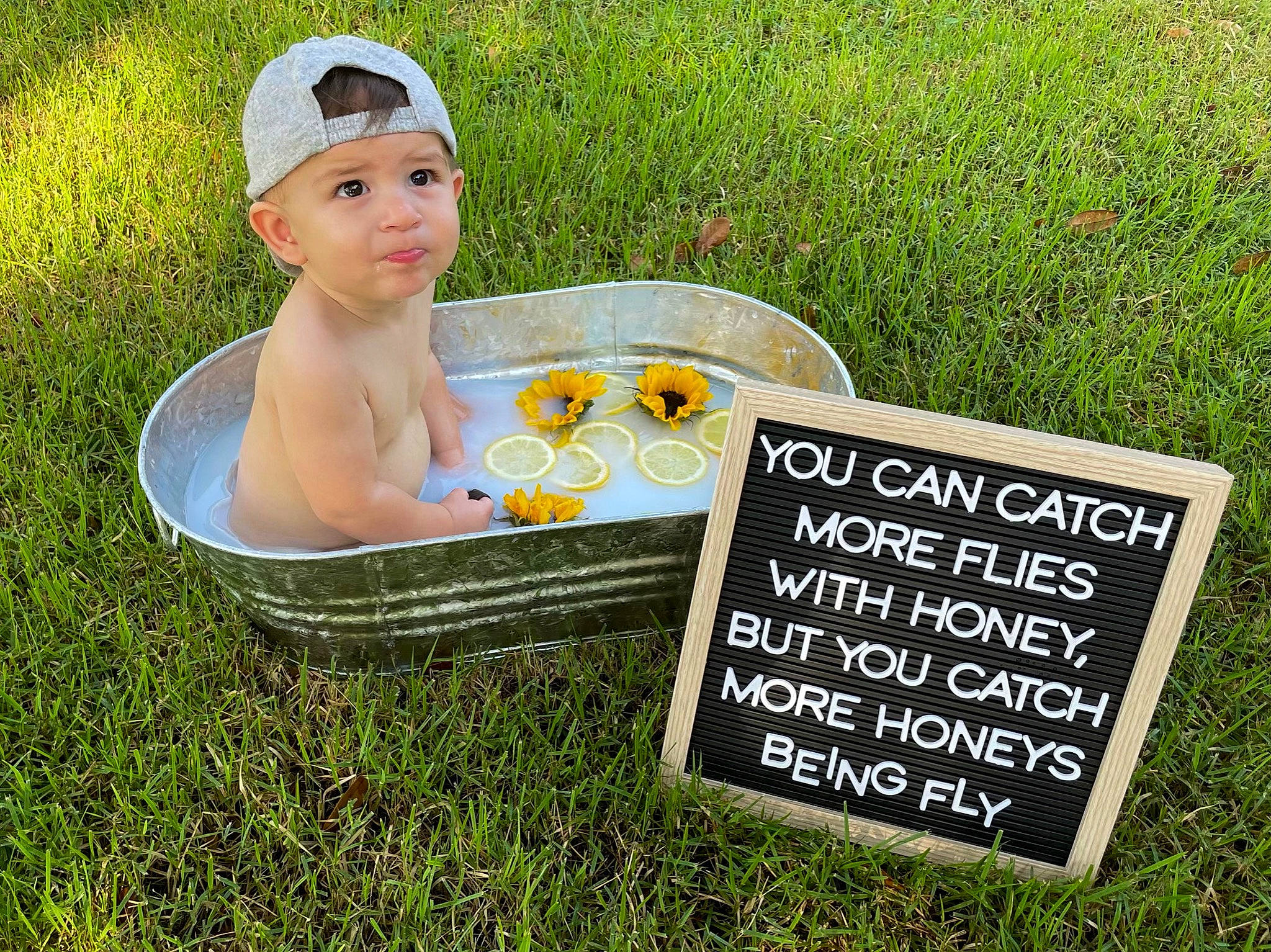 Nicholas joined the competition — help win amazing prizes! baby, baby_toddler_clothing, bathing, font, grass, grass_family, groundcover, handwriting, happy, headwear, lawn, leisure, meadow, people_in_nature, person, picture_frame, plant, recreation, rectangle, sitting
