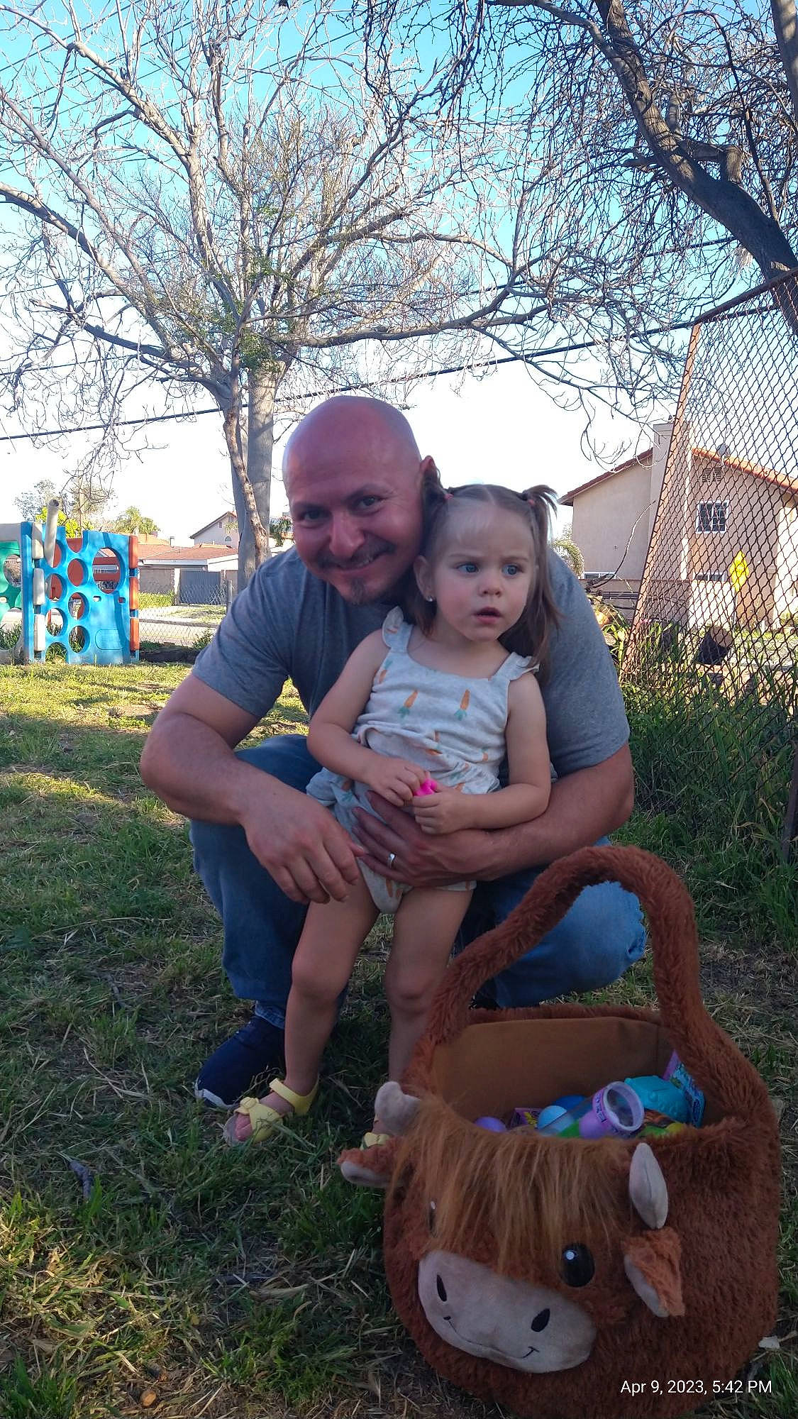 Delilah is registered to the contest to win money with this photo: baby, child, event, fun, grass, grass_family, happy, joy, lap, lawn, leaf, leg, leisure, person, plant, recreation, sandal, sitting, sky, smile