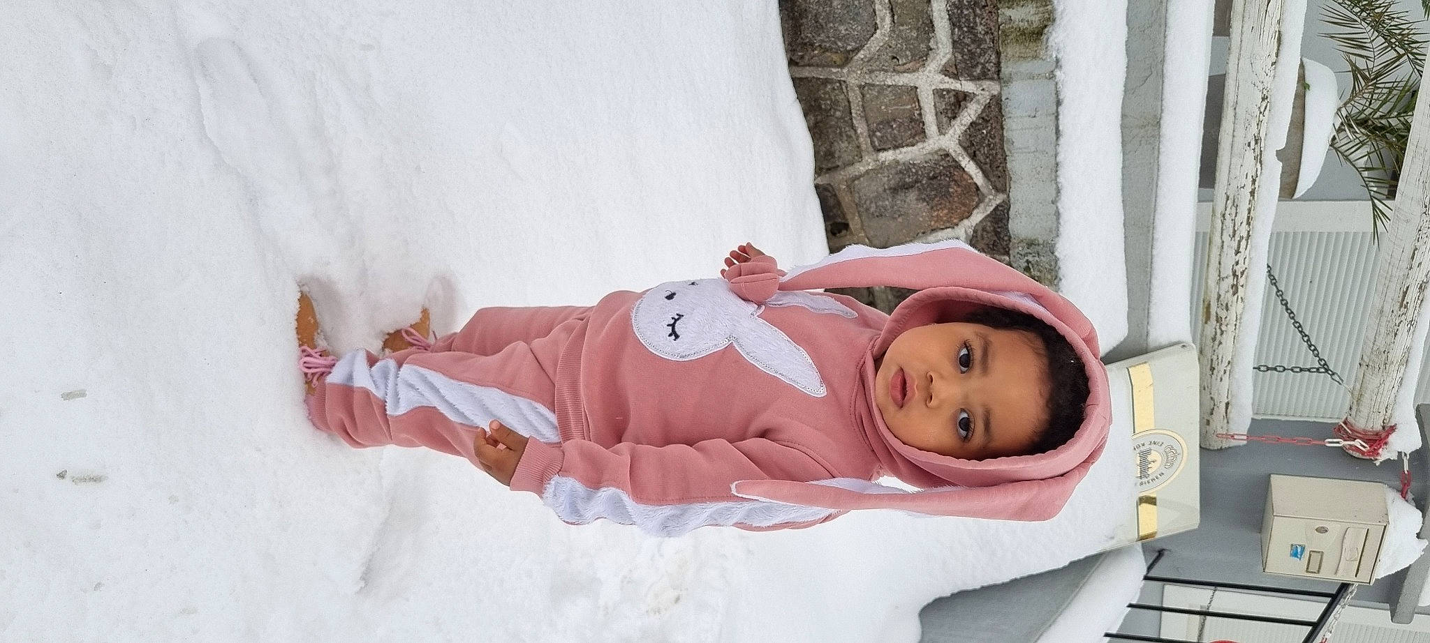 Ayleen a rejoint le concours — aidez-le/la à gagner de superbes lots ! baby, baby_products, baby_toddler_clothing, cheek, child, comfort, dress, freezing, fur, jacket, linens, magenta, peach, person, room, sitting, sleeve, snow, toddler, tree