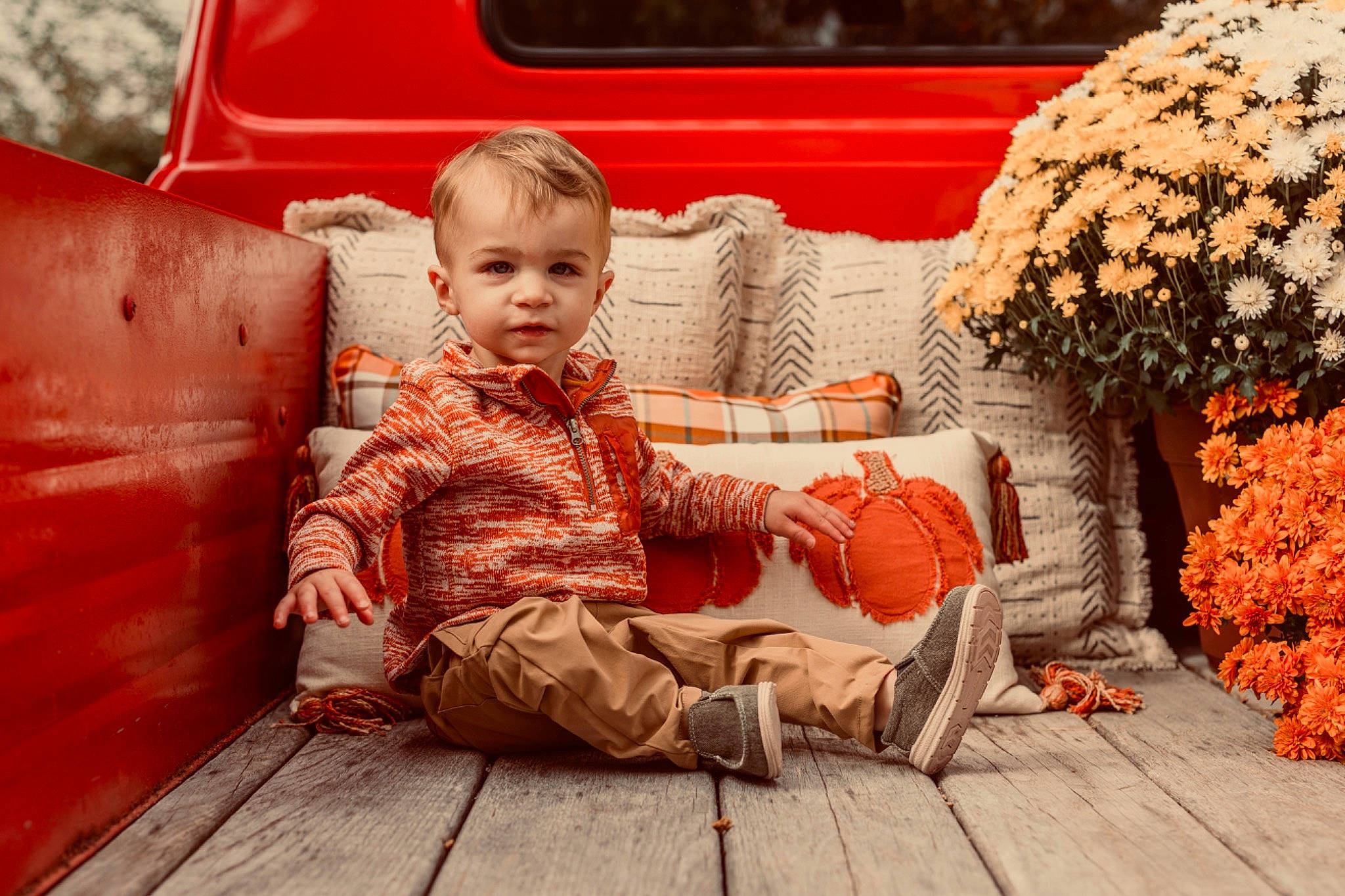 Chase joined the competition — help win amazing prizes! automotive_exterior, bumper, child, comfort, family_car, flooring, fun, grass, leisure, luxury_vehicle, motor_vehicle, orange, person, plant, sidewalk, sitting, toddler, tree, vacation, wood