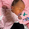 China is registered to the contest to win money with this photo: baby, baby_bottle, child, comfort, cozy, cute, face, hand, head, indoors, infant, newborn, nursery, pacifier, pink_blanket, pink_onesie, resting, sleeping, soft_texture, toddler