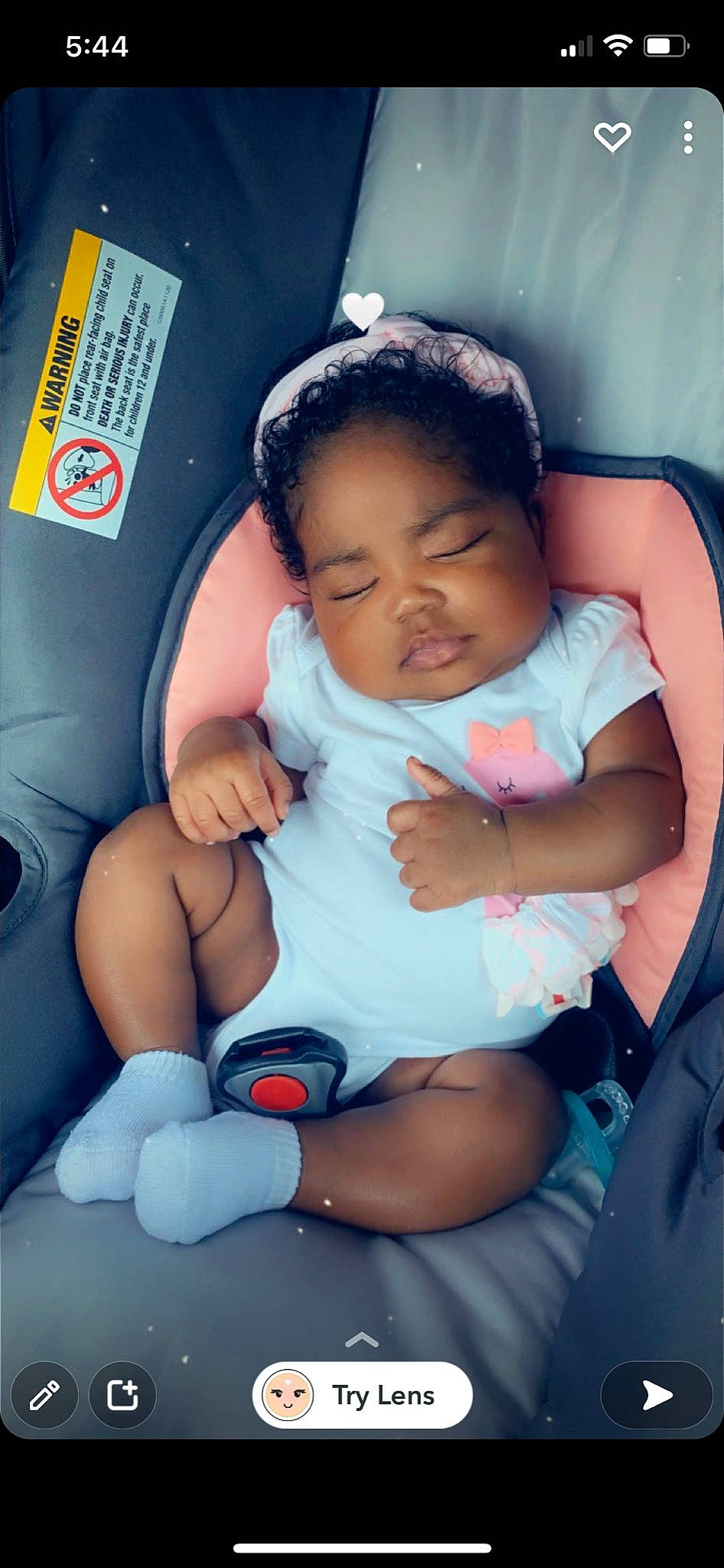 Torri is registered to the contest to win money with this photo: arm, baby, baby_products, baby_toddler_clothing, blue, car_seat, cheek, child, comfort, finger, fun, gesture, happy, lap, nail, person, product, sitting, skin, thumb