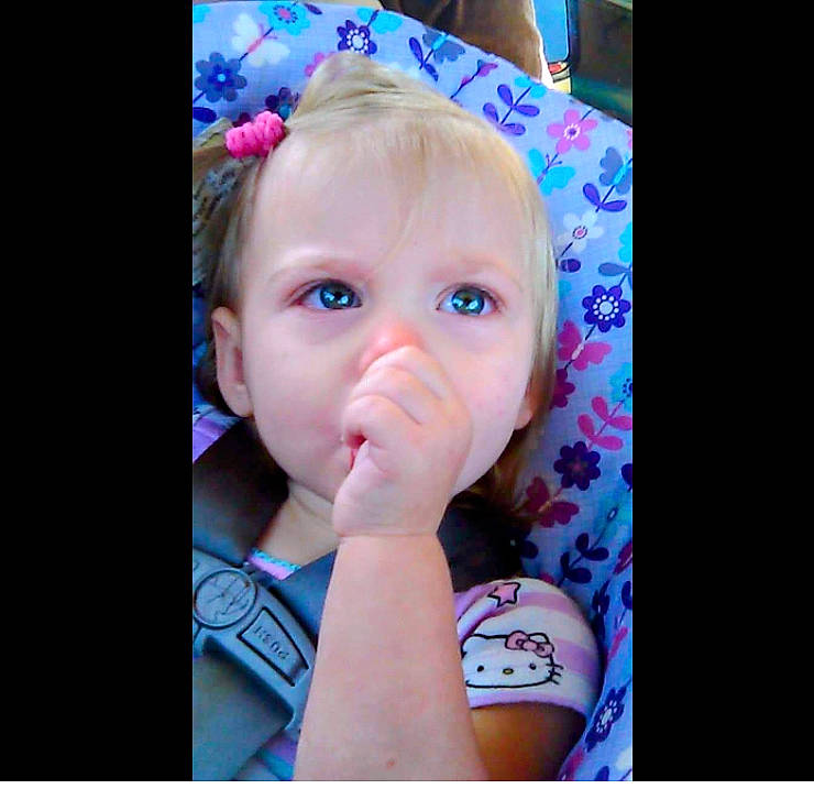 Carolyn is registered to the contest to win money with this photo: baby, cheek, child, ear, electric_blue, eyebrow, eyelash, flash_photography, gesture, hand, happy, lip, mouth, nail, nose, pattern, person, pink, skin, thumb