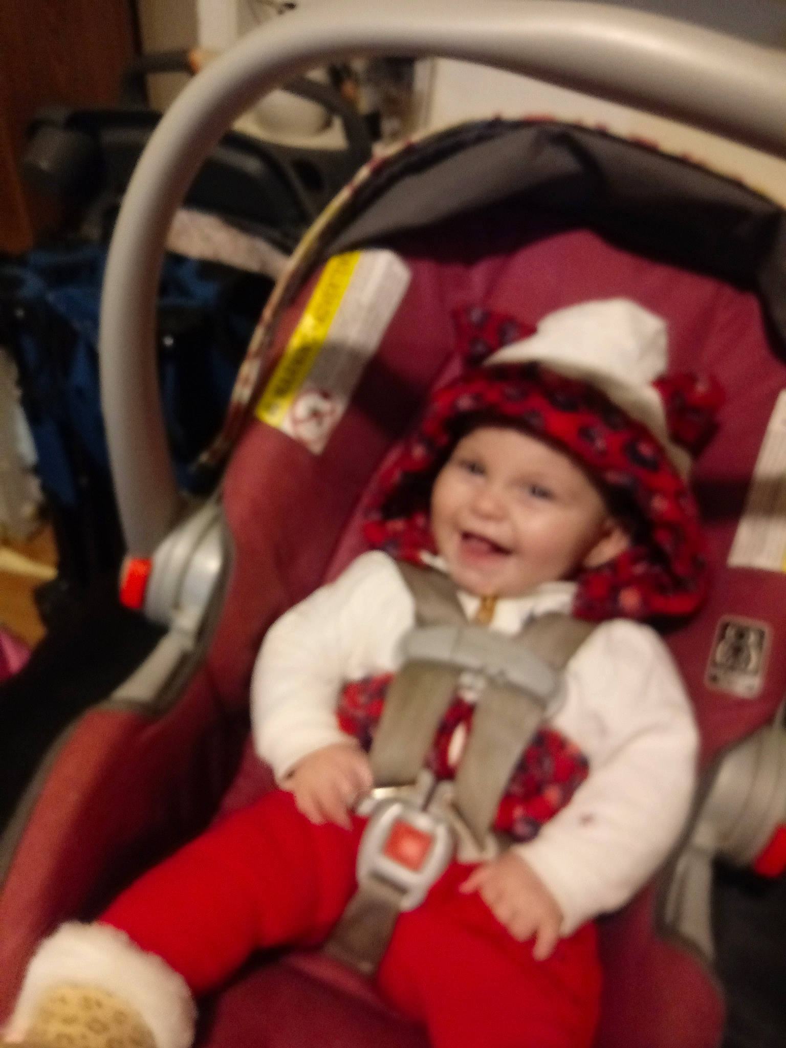 Carolyn joined the competition — help win amazing prizes! car_seat, child, christmas, holiday, joy, lap, person, product, red, toddler