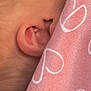 Astreya joined the competition — help win amazing prizes! ear, baby_skin, pink_blanket, heart_pattern, close_up, texture, fabric, skin, soft, infant, partial_view, detail, newborn, fold, wrinkle, comfort, warmth, baby, cute, cozy