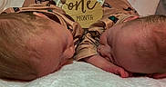 James And Jenson joined the competition — help win amazing prizes! newborn, baby, sleeping, infant, soft_blanket, matching_outfits, duck_print, wooden_sign, one_month, peaceful, cute, twin_babies, close_up, portrait, indoors, skin, head, face, resting, child