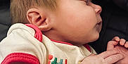 Ainsley Moate joined the competition — help win amazing prizes! baby, sleeping, infant, face, hand, skin, clothing, white, red_trim, closeup, peaceful, resting, newborn, portrait, soft, cute, child, person, indoors, padded_surface
