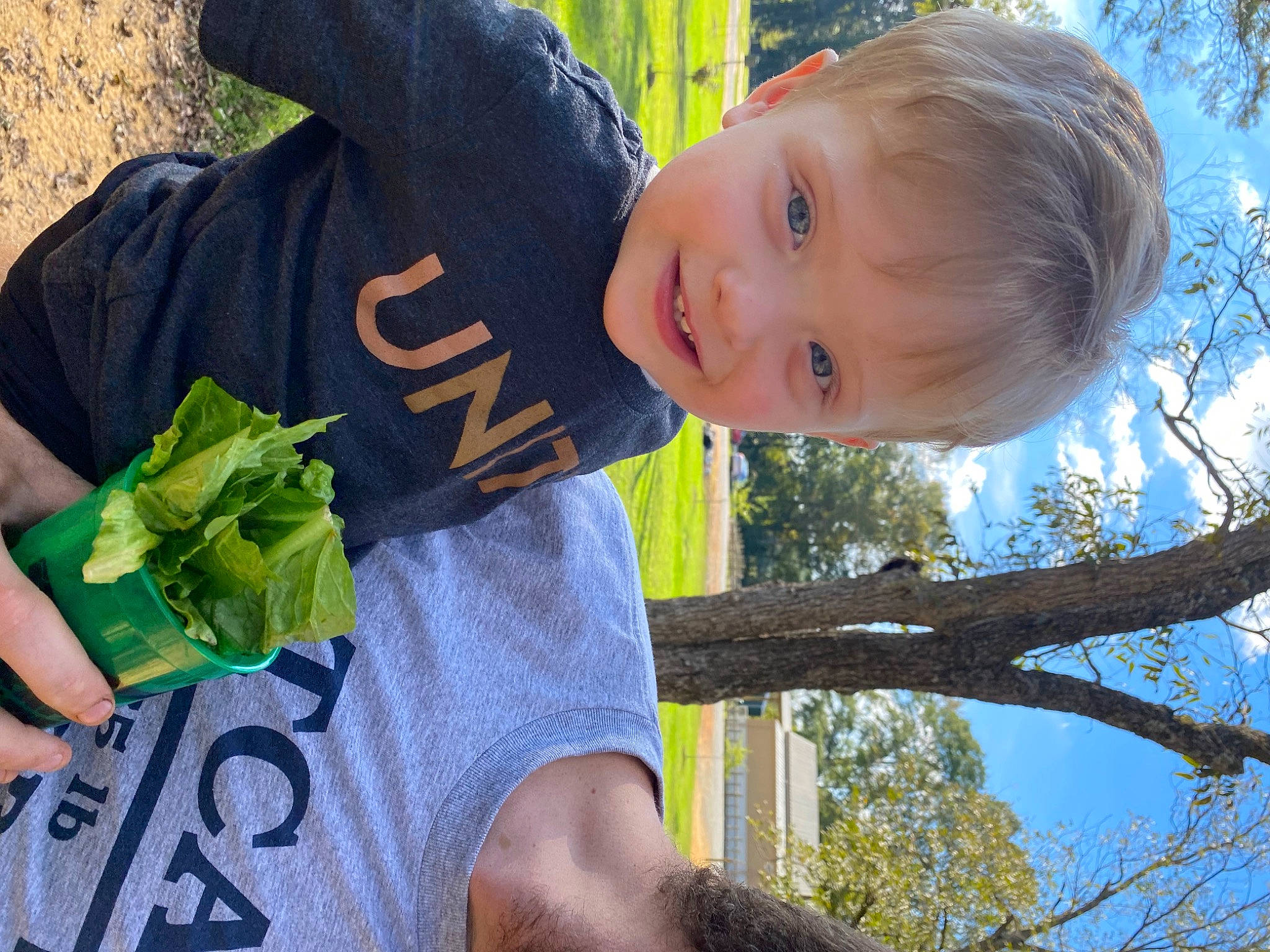 Daniell joined the competition — help win amazing prizes! adaptation, child, grass, green, happy, joint, leaf, leaf_vegetable, leisure, natural_environment, people_in_nature, person, plant, sky, sleeve, smile, t_shirt, toddler, tree, twig