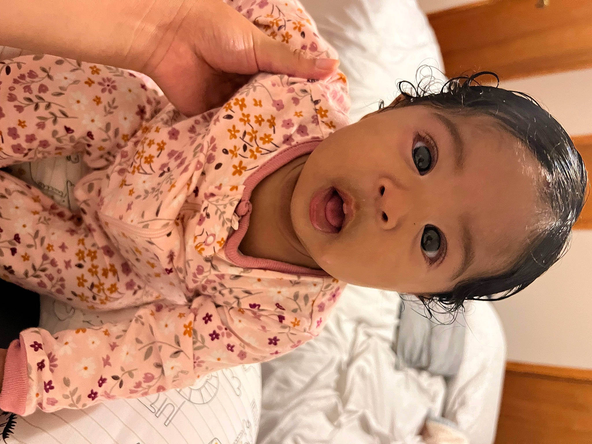 Luna is registered to the contest to win money with this photo: baby_toddler_clothing, cheek, child, dress, eye, eyelash, face, hand, happy, head, iris, lip, mouth, neck, nose, person, plant, skin, sleeve, surprise