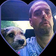 Rylee joined the competition — help win amazing prizes! man, dog, selfie, car_interior, portrait, pet, canine, casual_clothing, facial_hair, window, daylight, closeup, head_and_shoulders, looking_away, indoor, seat, animal, human, friendship, heart_frame