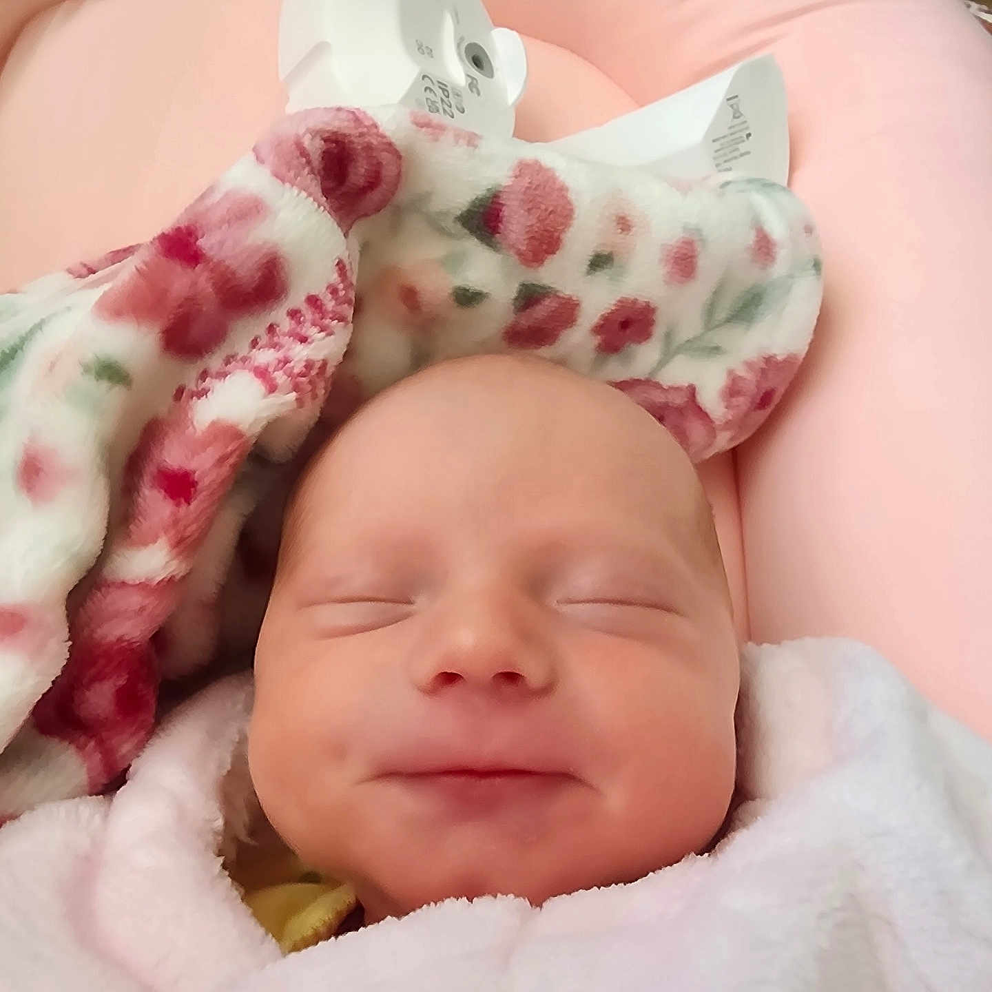 Lilly is registered to the contest to win money with this photo: baby, bed, blanket, clothing, crib, cushion, face, furniture, hat, head, homedecor, infantbed, newborn, person, photography, portrait, quilt, sleeping, tape, towel