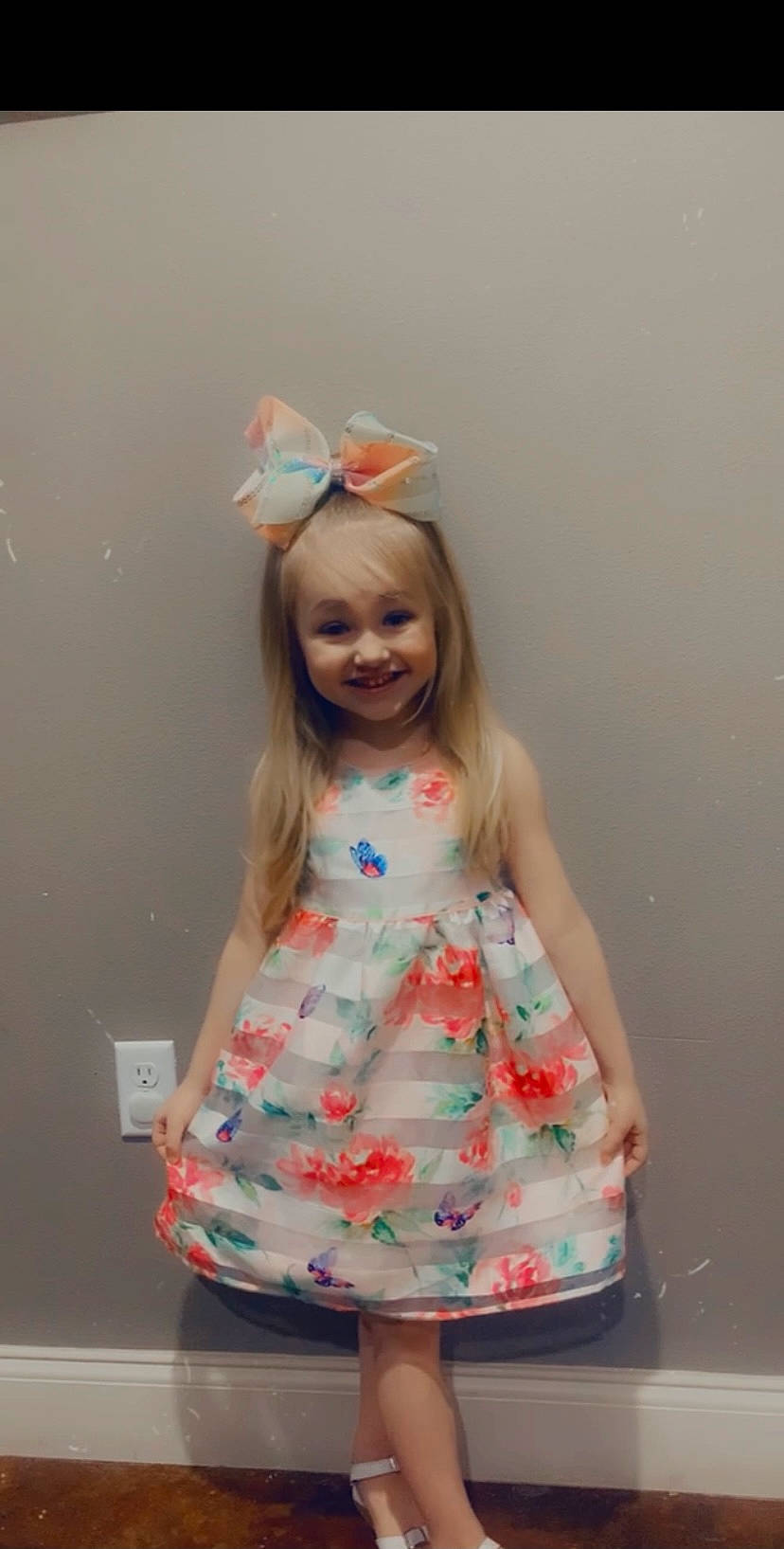Kinley is registered to the contest to win money with this photo: arm, baby_toddler_clothing, child, day_dress, design, dress, eye, fashion_accessory, hair, happy, human_body, joy, magenta, pattern, peach, person, pink, sleeve, smile, t_shirt