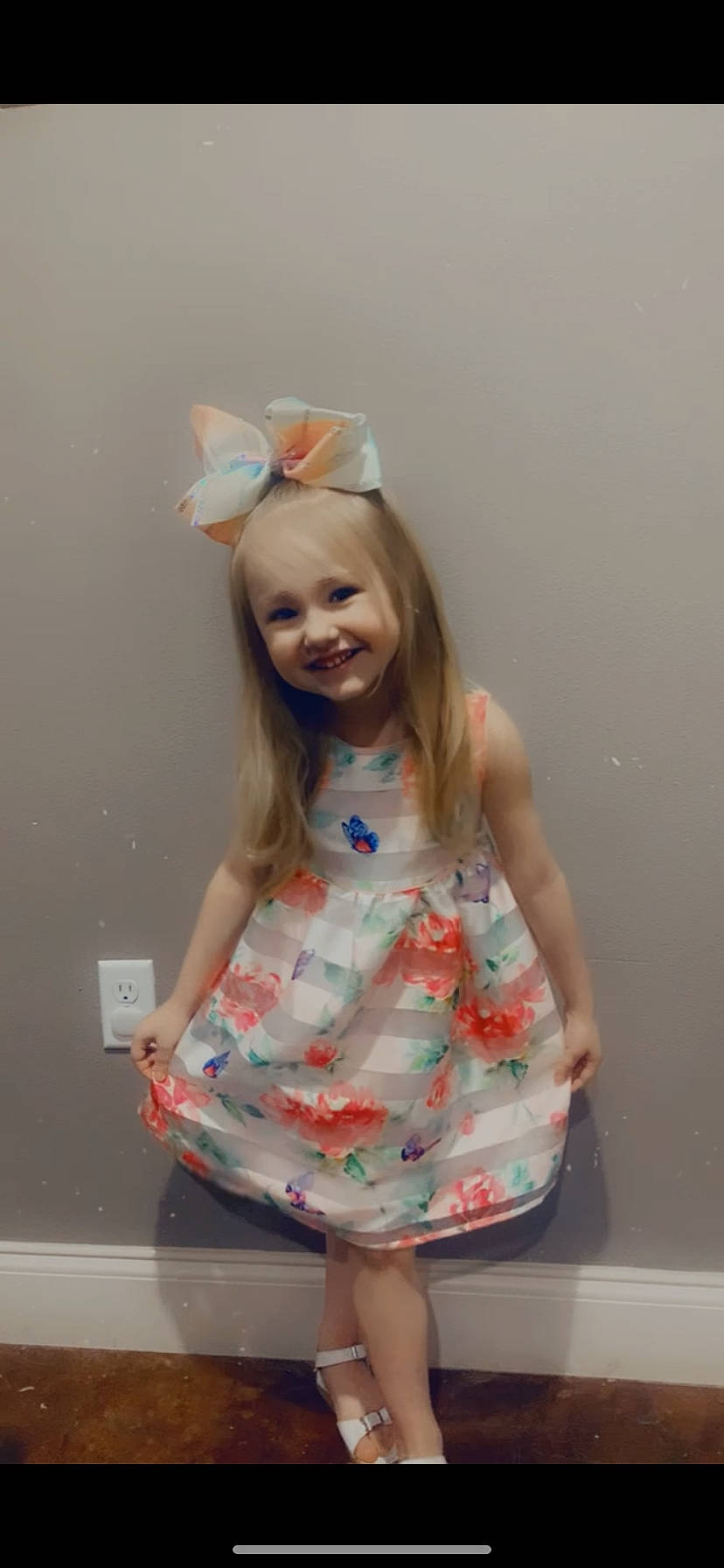 Kinley is registered to the contest to win money with this photo: baby_toddler_clothing, child, clothing, day_dress, dress, facial_expression, finger, fun, gesture, hair, hairstyle, hand, happy, head, joy, one_piece_garment, person, pink, skin, sleeve