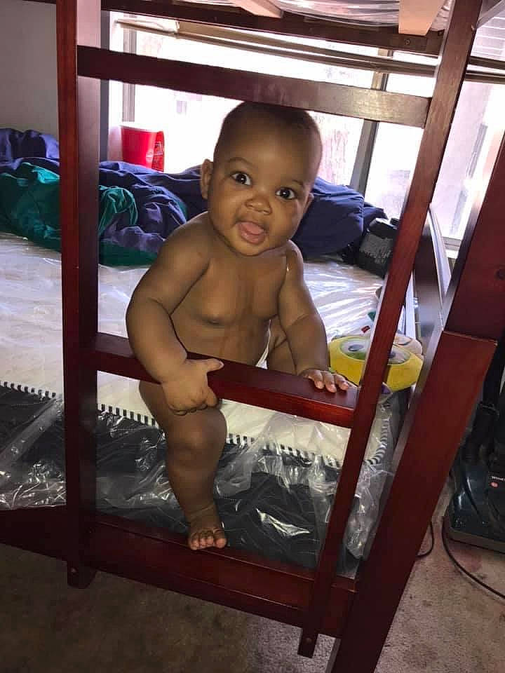 Tymir is registered to the contest to win money with this photo: abdomen, baby, baby_products, baby_safety, barechested, barefoot, bathing, bed, chest, child, foot, linens, person, product, stomach, toddler, toe, trunk