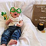 Jagger is registered to the contest to win money with this photo: baby, celebration, cereal, cute, festive, hand_prop, holiday_prop, indoor, infant, jeans, letterboard, onesie, portrait, pot_of_gold, shamrock_glasses, sitting, smiling, sparkle_glasses, st_patricks_sign, white_sheet