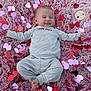 Jagger is registered to the contest to win money with this photo: baby, celebration, child, cozy, cute, hands, heart_confetti, holiday, infant, lying_down, onesie, pink_rug, portrait, scrunched_face, smile, soft_texture, striped_clothing, toes, valentine, wooden_token