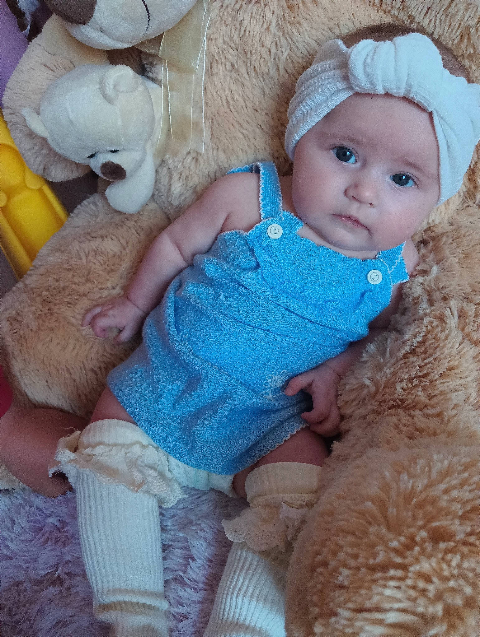 Lola participe au concours pour gagner de l'argent avec cette photo : baby, baby_toddler_clothing, cap, cheek, child, doll, eye, fawn, fur, headwear, iris, knit_cap, mammal, pattern, person, pink, skin, sleeve, toddler, toy