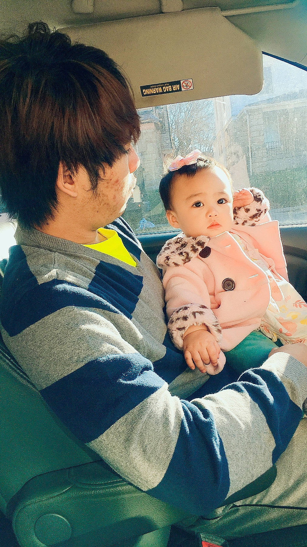 Nora is registered to the contest to win money with this photo: baby, baby_products, baby_toddler_clothing, ear, human, love, person, sock, sweater, toddler