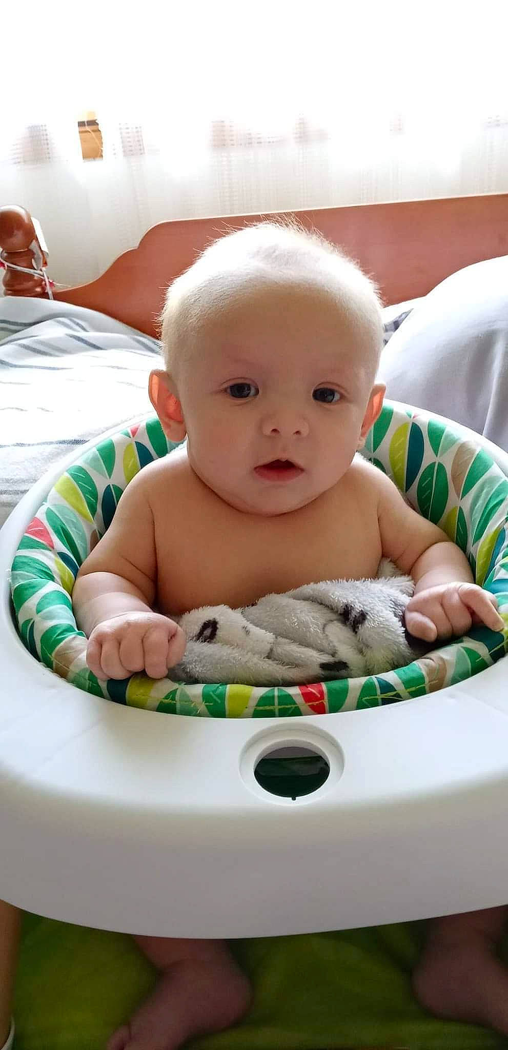 Casey is registered to the contest to win money with this photo: baby, baby_products, baby_safety, baby_toddler_clothing, bathing, cheek, child, comfort, eye, eyelash, fun, iris, linens, mouth, person, product, room, sitting, skin, toddler