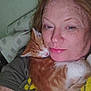 person, cat, kitten, sleeping, snuggling, indoor, closeup, face, redhead, freckles, tshirt, comfort, pet, animal, resting, feline, cute, cozy, shoulder, affection