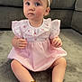 Sapphire is registered to the contest to win money with this photo: toddler, child, pink_dress, headband, anklet, carpet, couch, indoor, sitting, curious, baby, cute, portrait, person, furniture, soft_lighting, home, decor, accessory, expression
