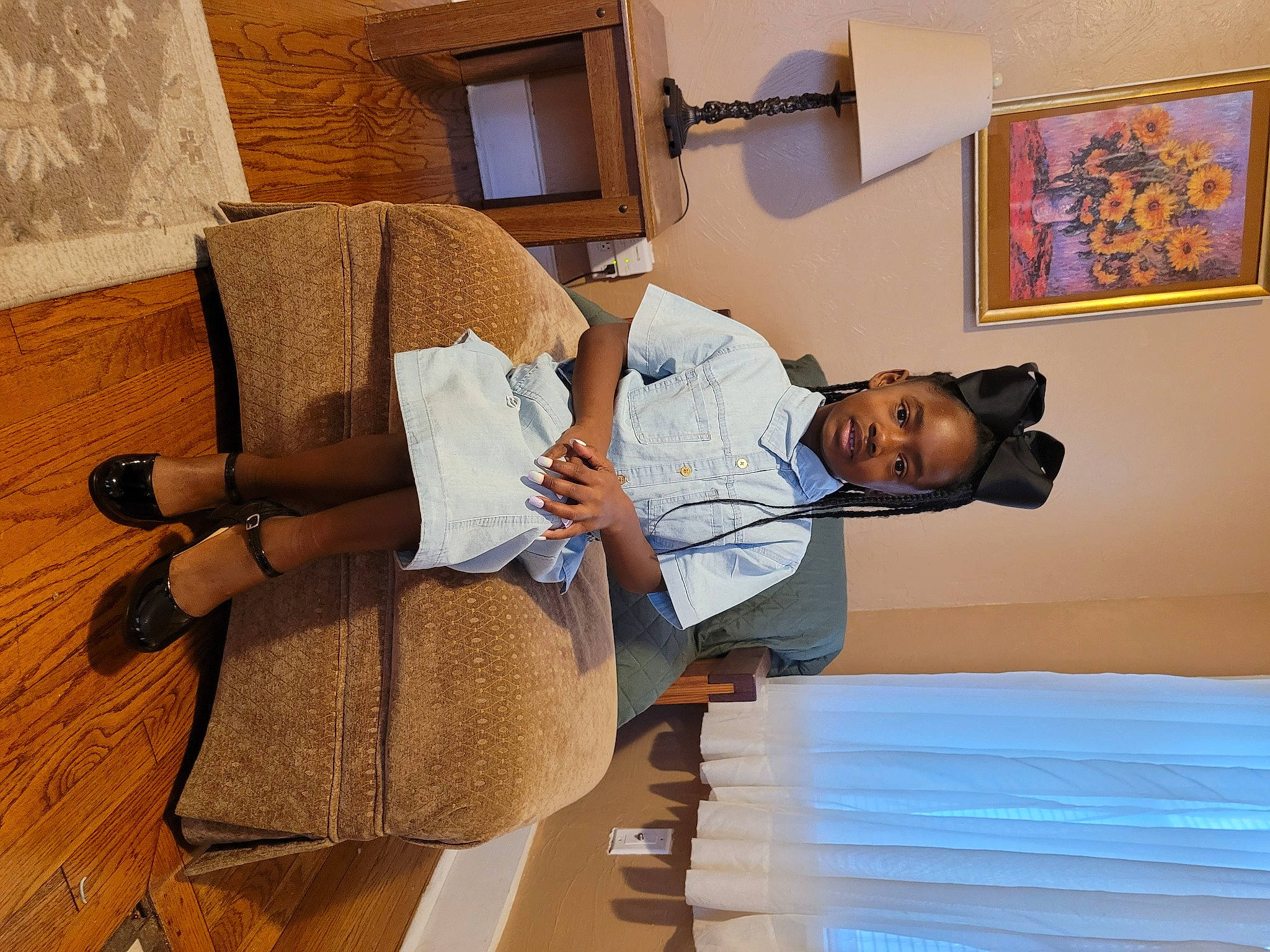 Monica joined the competition — help win amazing prizes! arm, bag, comfort, couch, eyewear, flooring, hardwood, joint, lamp, leisure, linens, living_room, luggage_and_bags, person, picture_frame, room, sitting, table, thigh, visual_arts