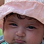baby, child, face, hat, pink, striped_shirt, curious, close_up, portrait, cheeks, expression, infant, person, cute, headwear, young, app_icons, mobile_screen, orange_starfish, clothing