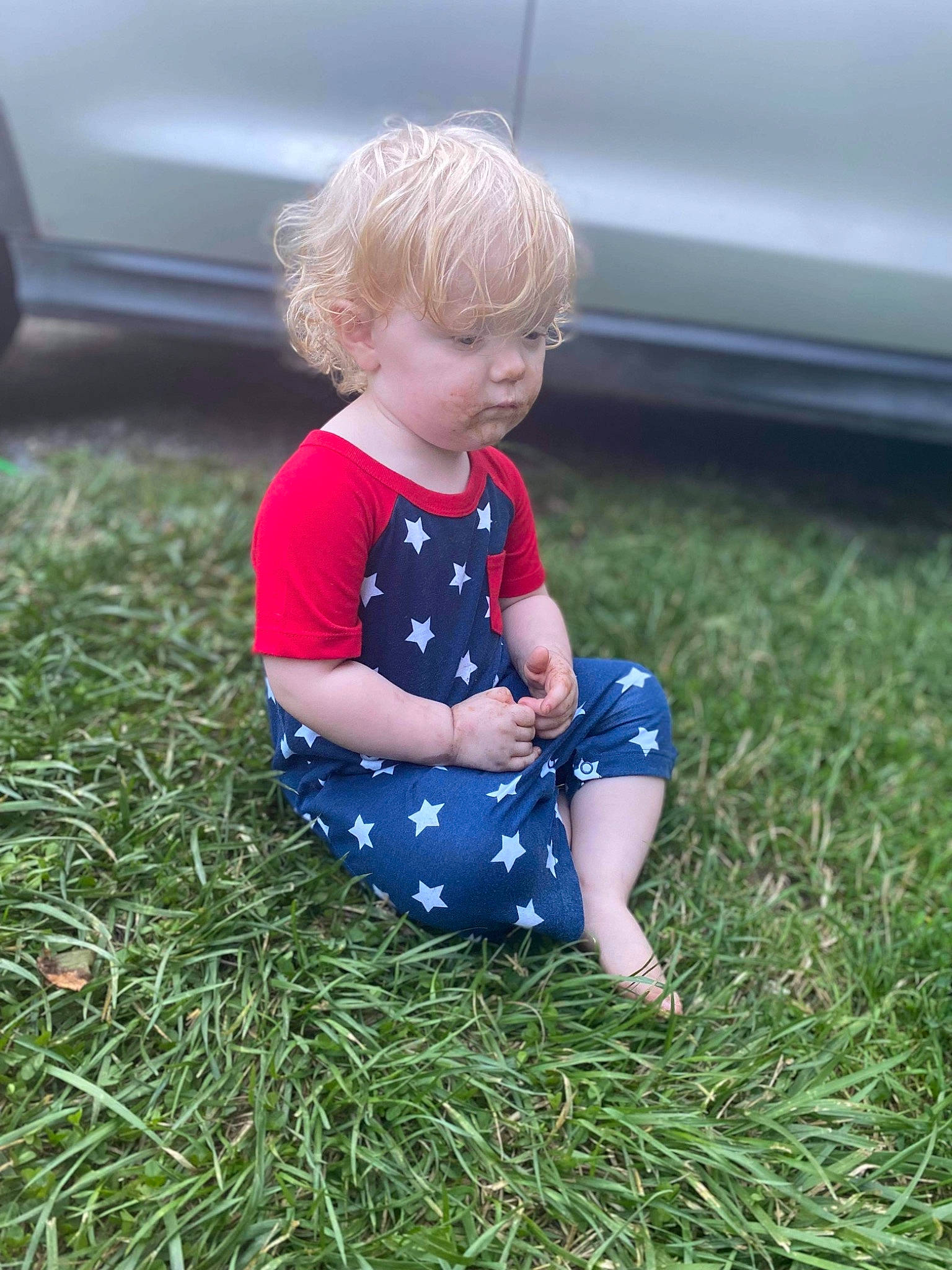 Grayson joined the competition — help win amazing prizes! baby, baby_toddler_clothing, child, electric_blue, flooring, fun, grass, grassland, lawn, mammal, pattern, people_in_nature, person, plant, sitting, sleeve, summer, t_shirt, tire, toddler