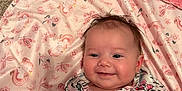 Brenlee joined the competition — help win amazing prizes! baby, bed, blanket, clothing, coat, crib, cushion, face, furniture, happy, head, homedecor, infantbed, newborn, pattern, person, photography, portrait, quilt, smile