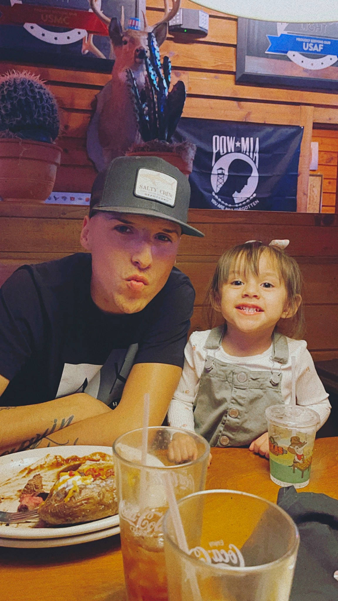 Jakayla is registered to the contest to win money with this photo: baseball_cap, bowl, cap, chair, comfort_food, cooking, cuisine, dish, event, flowerpot, food, hat, headwear, ingredient, joy, person, plate, sharing, smile, t_shirt